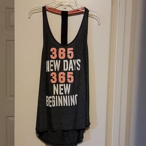 2 slighlty used workout tanks